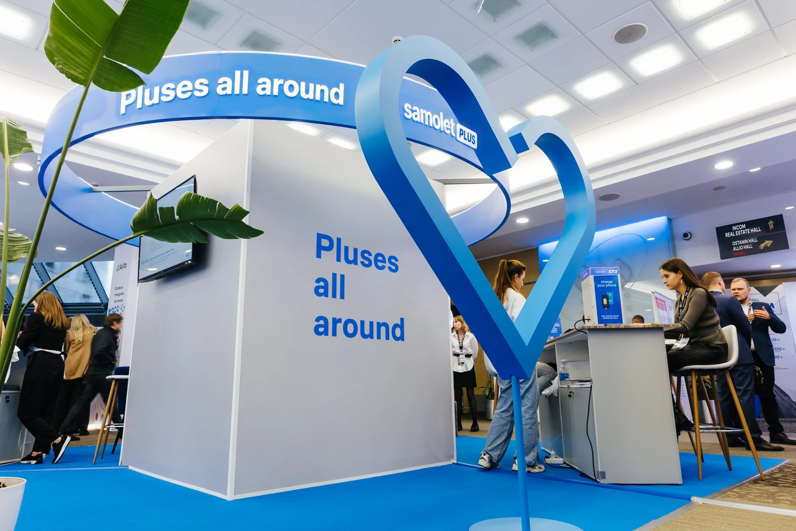 Samolet Plus stand at the real-estate fair: all around, nothing but pluses