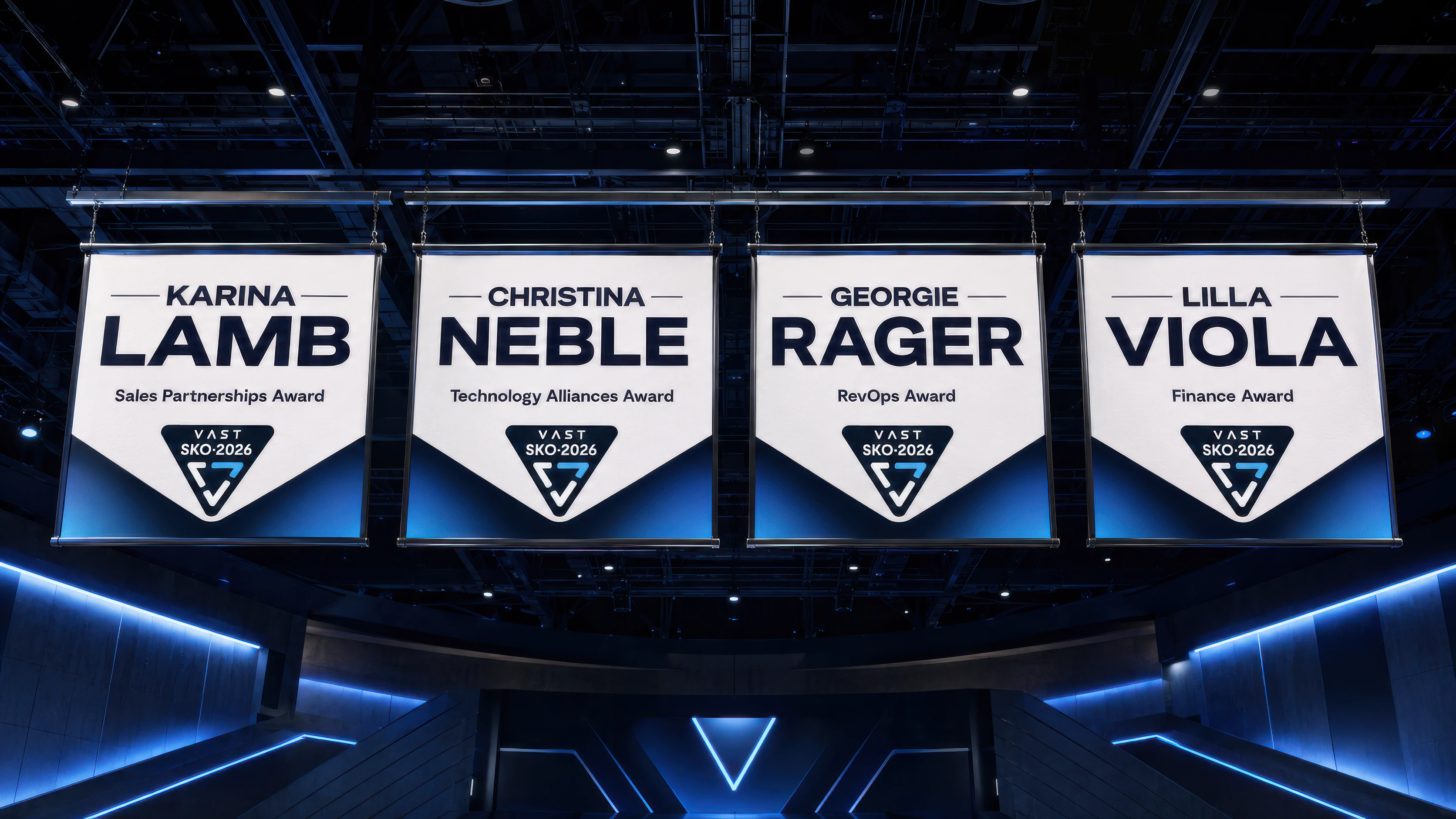 Personal award banners above the SKO stage