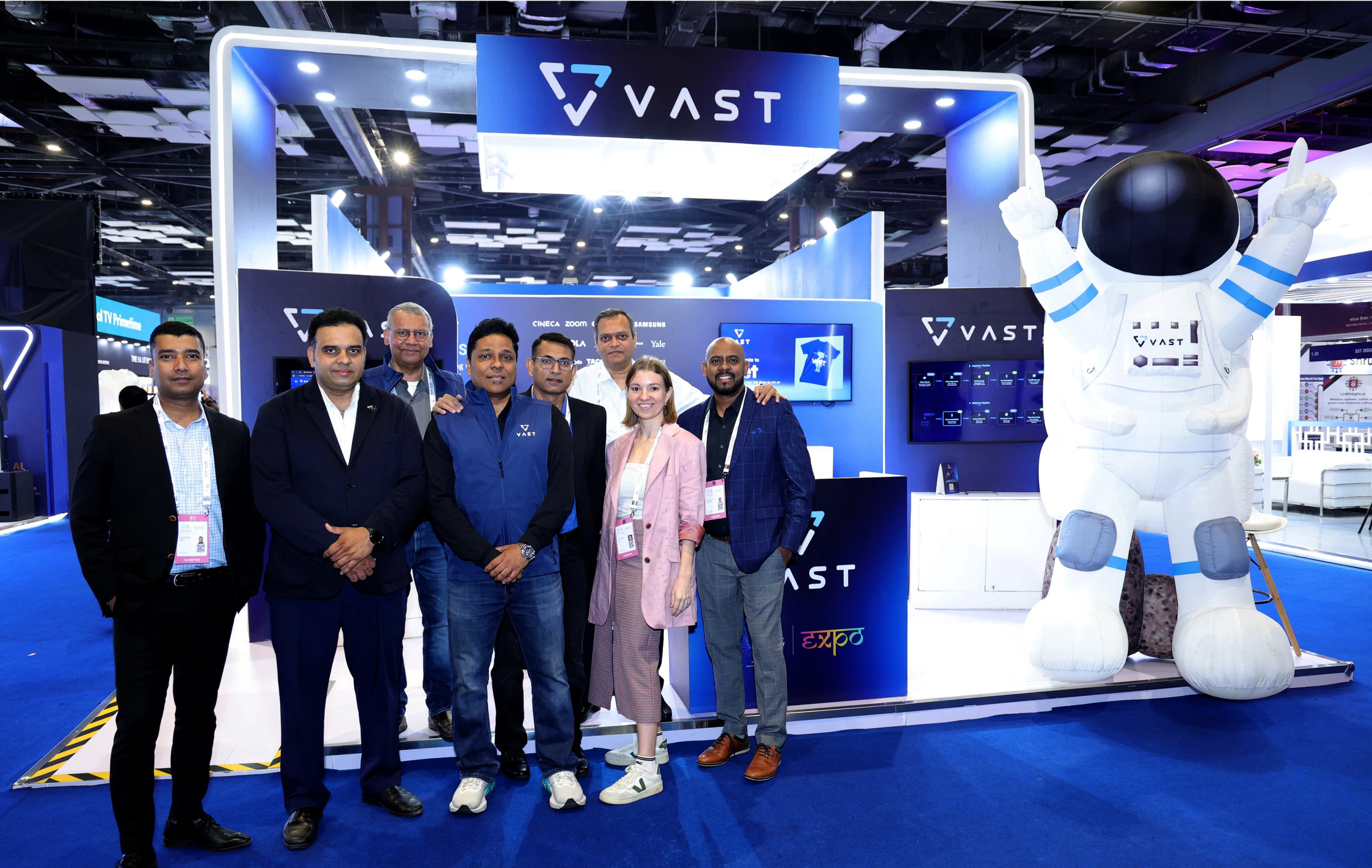 VAST booth team with the inflatable VASTronaut